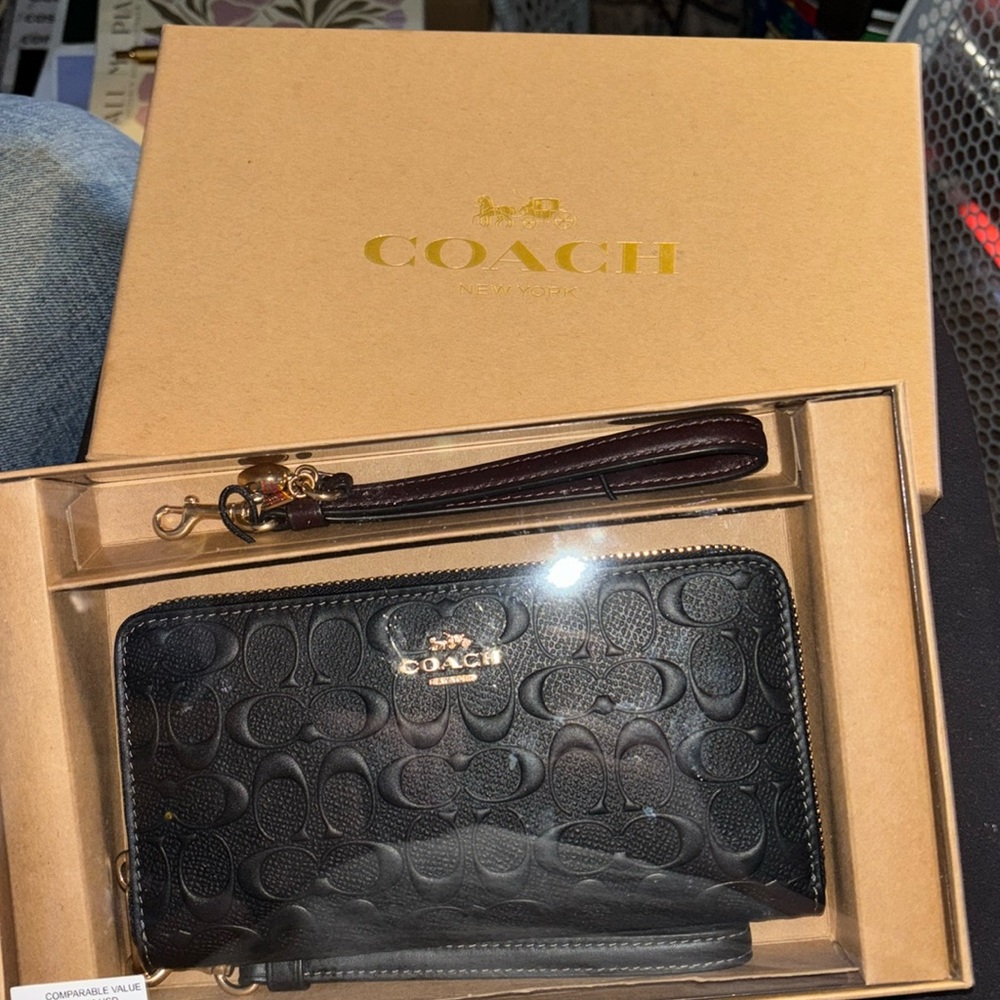 Black Coach Embellished Wallet.